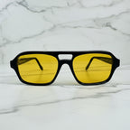 wide shot of the Champagne Sunset sunglasses frame and yellow lens