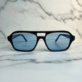wide angle detail of the Ocean Breeze sunglasses frame and blue lens