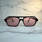 full width of the Rose Harbour sunglasses frame and pink lens
